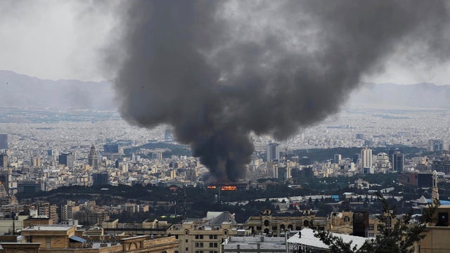 Smoke rises after a reported Israeli strike on a building used by Islamic Republic of Iran News Network, part of Iran's state TV broadcaster, on June 16, 2025, in Tehran, Iran. 